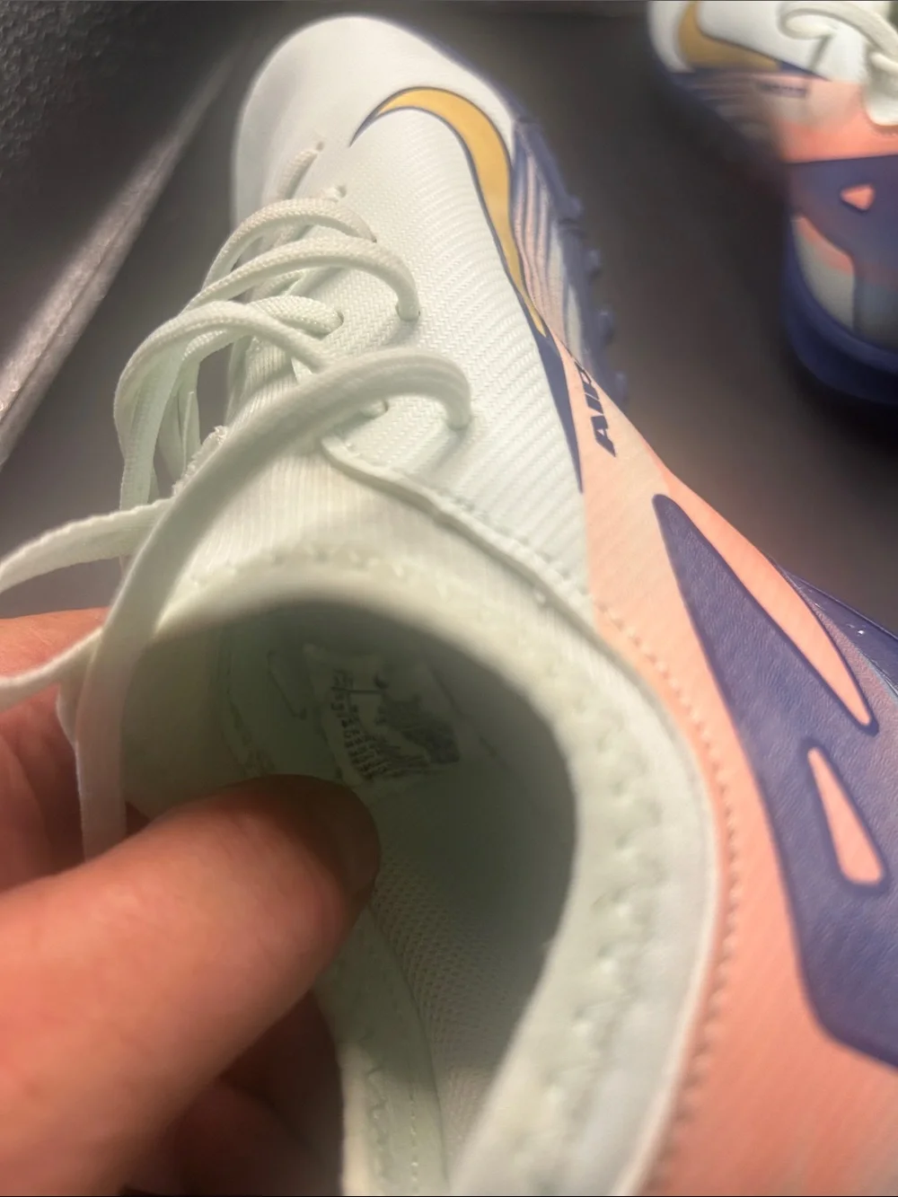 Nike Air Zoom Light Mint Soccer Shoes with Yellow Swoosh and Pastel Heel Accents